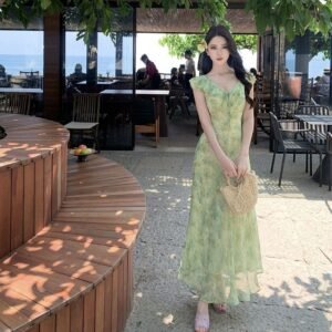 Fresh Beachy Getaway Dress In Green With A Dainty Floral Print And Cap Sleeves