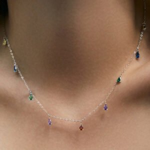 A Minimalist 925 Silver Necklace Featuring A Pendant With 9 Colorful Teardrop shaped Pendants